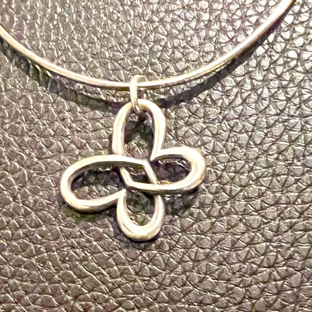 A retired James Avery connected hearts pendent